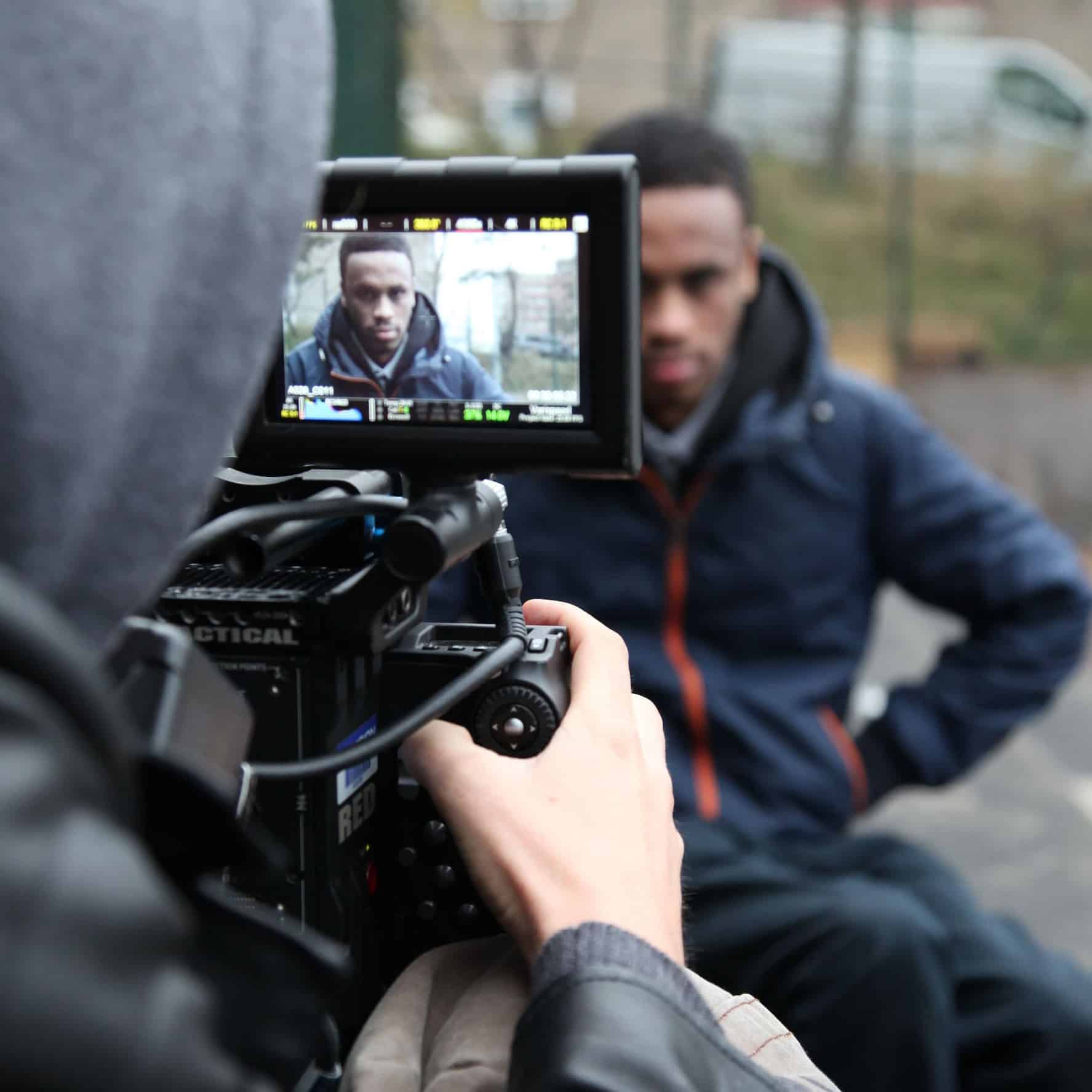 Image of Hassan filming for the Writing Britain Film
